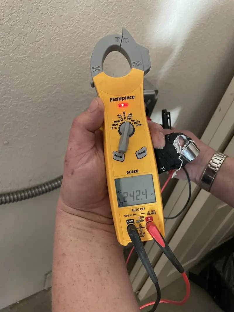 Voltage testing with clamp meter during Electrical Installation Services in Larkfield-Wikiup